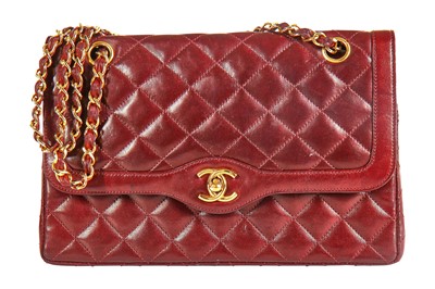 Lot 2 - A Chanel bordeaux-red quilted lambskin leather flap bag, 1980s