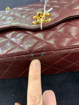 Lot 2 - A Chanel bordeaux-red quilted lambskin leather flap bag, 1980s