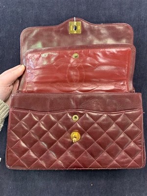 Lot 2 - A Chanel bordeaux-red quilted lambskin leather flap bag, 1980s