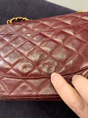 Lot 2 - A Chanel bordeaux-red quilted lambskin leather flap bag, 1980s