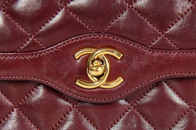 Lot 2 - A Chanel bordeaux-red quilted lambskin leather flap bag, 1980s