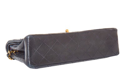 Lot 8 - A Chanel navy quilted lambskin leather flap bag, 1980s