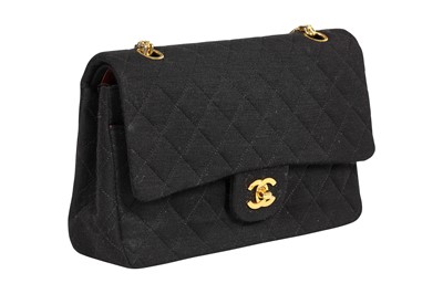 Lot 4 - A Chanel black quilted wool-jersey flap bag, 1989-91