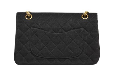 Lot 4 - A Chanel black quilted wool-jersey flap bag, 1989-91