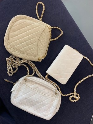 Lot 12 - Three Chanel quilted lambskin leather handbags in shades of white, 1980s
