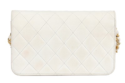 Lot 12 - Three Chanel quilted lambskin leather handbags in shades of white, 1980s