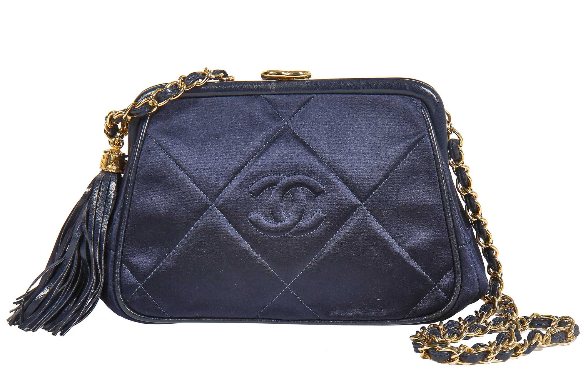 Lot 5 - A Chanel quilted midnight-blue satin evening
