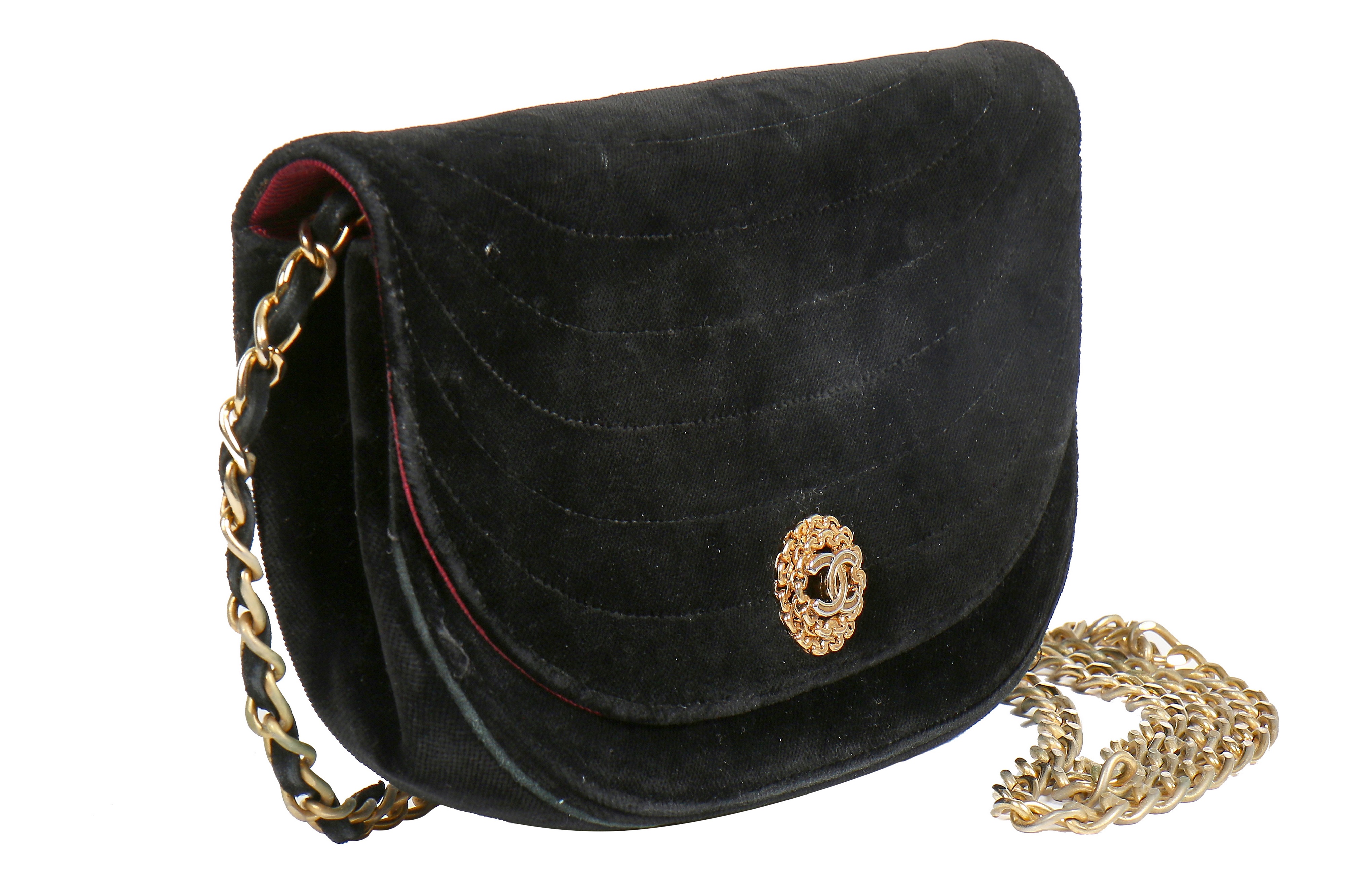 Lot 10 - A Chanel quilted black velvet evening bag