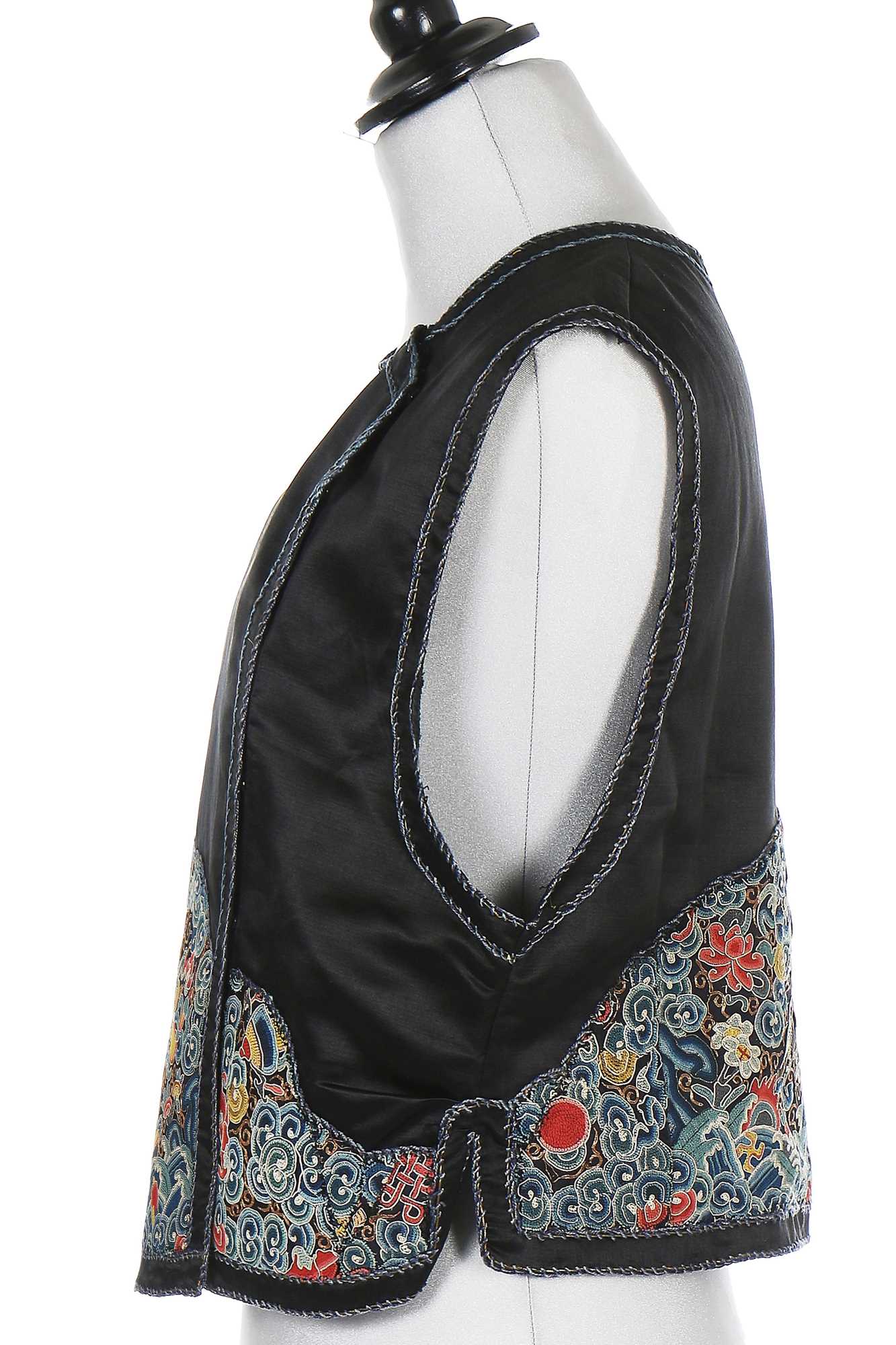 Lot 463 - An embroidered bodice, Chinese for the European market, 1920s and others
