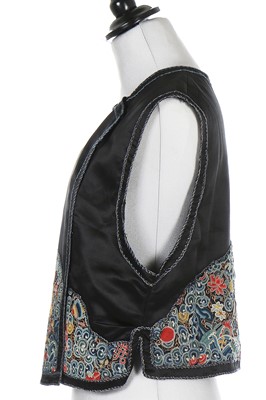 Lot 463 - An embroidered bodice, Chinese for the European market, 1920s and others