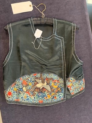 Lot 463 - An embroidered bodice, Chinese for the European market, 1920s and others