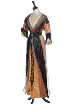 Lot 236 - An orange satin evening gown, 1912-1913