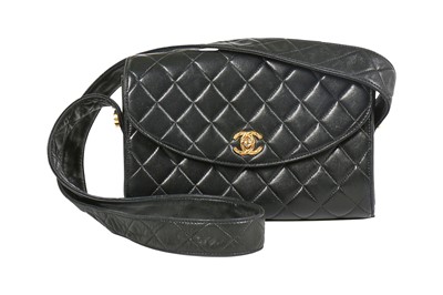 Lot 9 - A Chanel black quilted lambskin leather bag, circa 1992