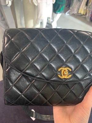 Lot 9 - A Chanel black quilted lambskin leather bag, circa 1992