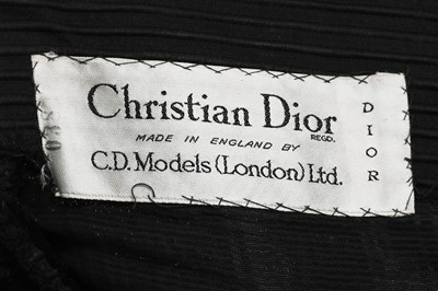 Lot 82 - A Christian Dior London black ottoman satin cocktail dress, model 'Sonnet', Autumn-Winter 1952