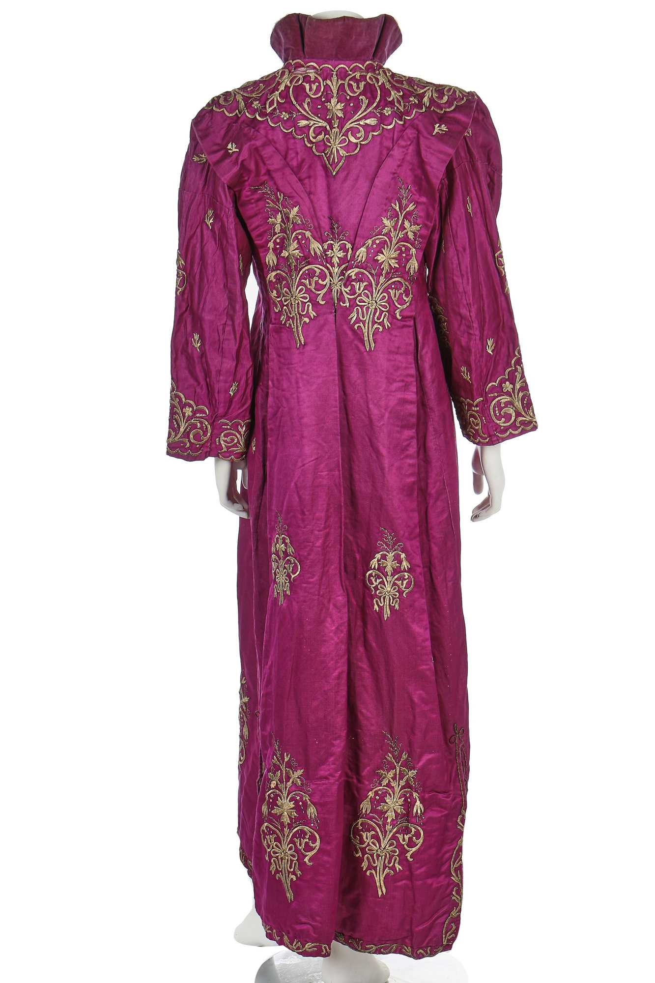 Lot 293 - A purple satin robe adorned with arabesques
