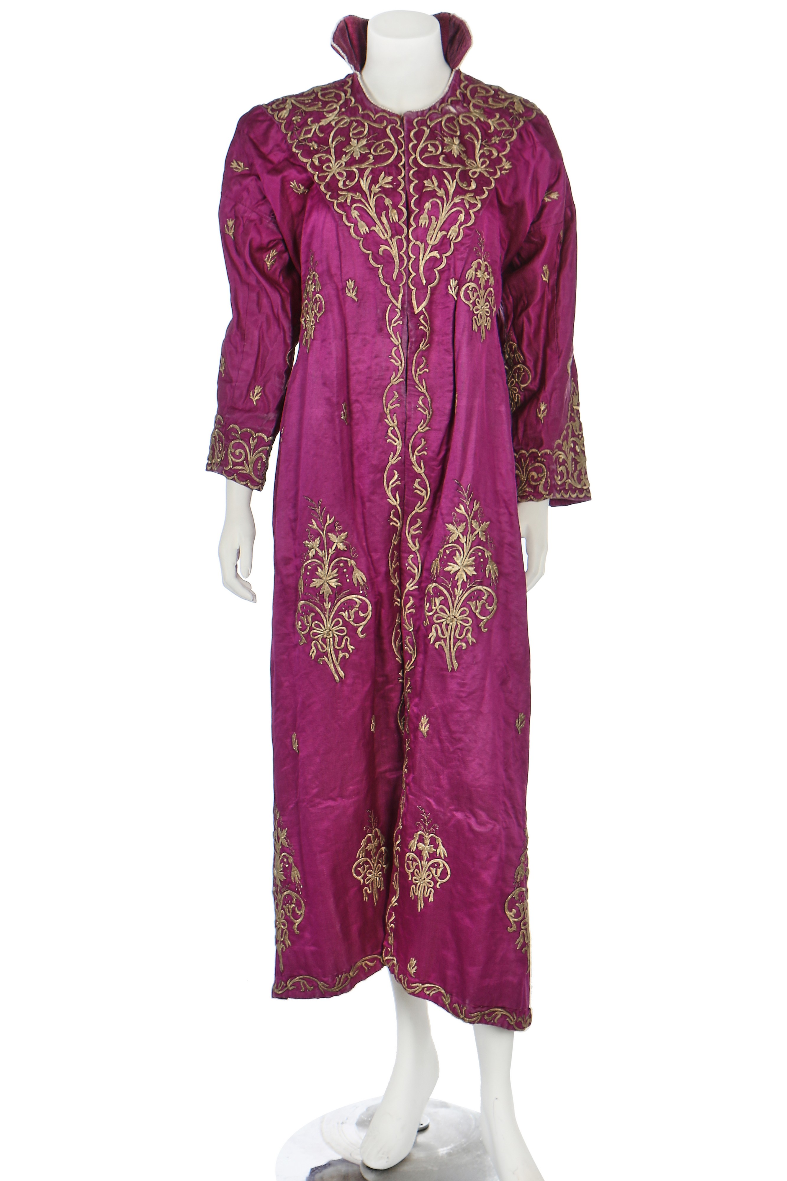 Lot 293 - A purple satin robe adorned with arabesques