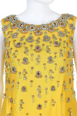 Lot 189 - A Douglas Darnell canary-yellow silk evening gown, early 1960s