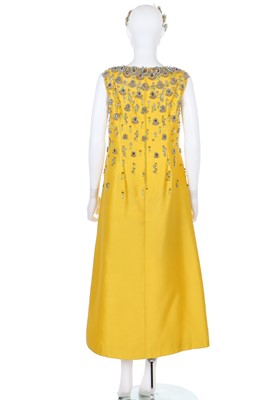 Lot 189 - A Douglas Darnell canary-yellow silk evening gown, early 1960s
