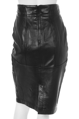 Lot 124 - Two Azzedine Alaïa black leather skirts, 1980s-early 1990s