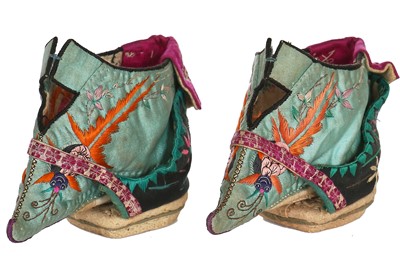 Lot 302 - A pair of embroidered silk 'Lotus bud' slippers in pattens for bound feet, Chinese, 1920s