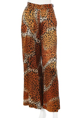 Lot 153 - An Yves Saint Laurent tiger and leopard-printed viscose three-piece ensemble, late 1980s-early 1990s