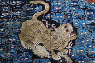 Lot 317 - An embroidered silk 'tiger' military rank badge, Chinese, Qing dynasty, 19th century