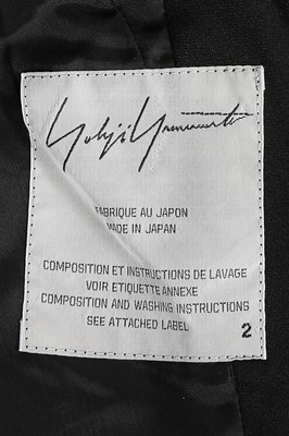 Lot 189 - A Yohji Yamamoto black silk suit with padded cuffs, 1990s