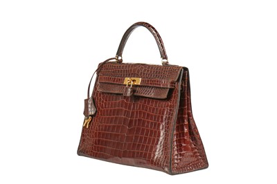 Lot 5 - An Hermès brown crocodile Kelly bag, late 1960s