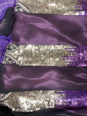 Lot 64 - A fine and rare Paul Poiret purple sequined evening dress, 1928
