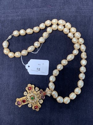Lot 15 - A Chanel baroque 'pearl' necklace with large bejewelled gilt crucifix pendant, 1985