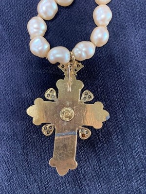 Lot 15 - A Chanel baroque 'pearl' necklace with large bejewelled gilt crucifix pendant, 1985