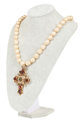 Lot 15 - A Chanel baroque 'pearl' necklace with large bejewelled gilt crucifix pendant, 1985