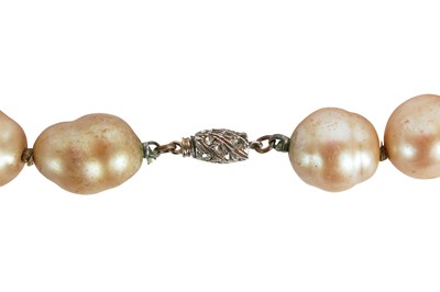 Lot 15 - A Chanel baroque 'pearl' necklace with large bejewelled gilt crucifix pendant, 1985