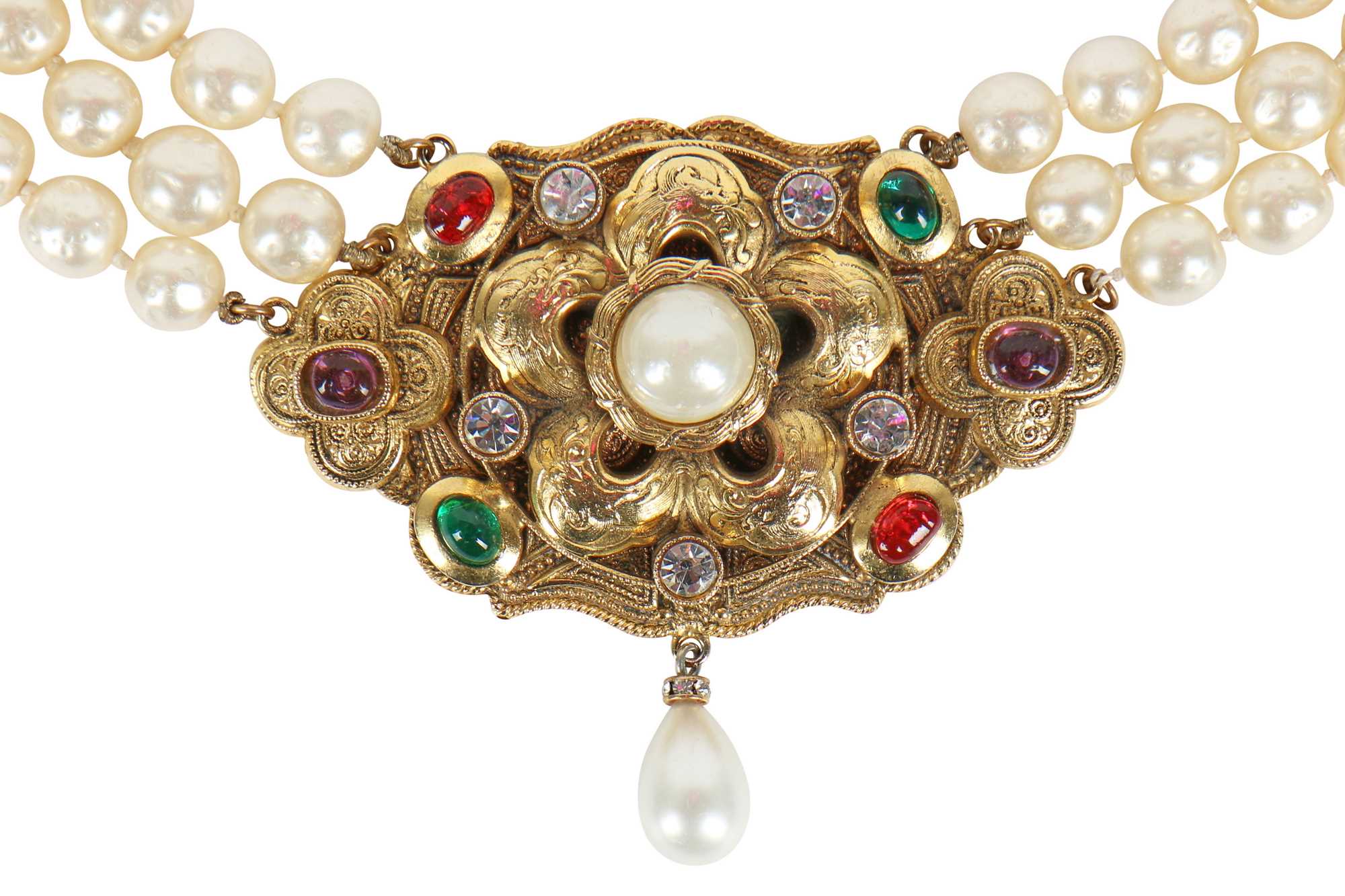Click for high resolution Lot 13 - A fine Chanel three-strand 'pearl' necklace with bejewelled gilt plaquette, 1971-1981