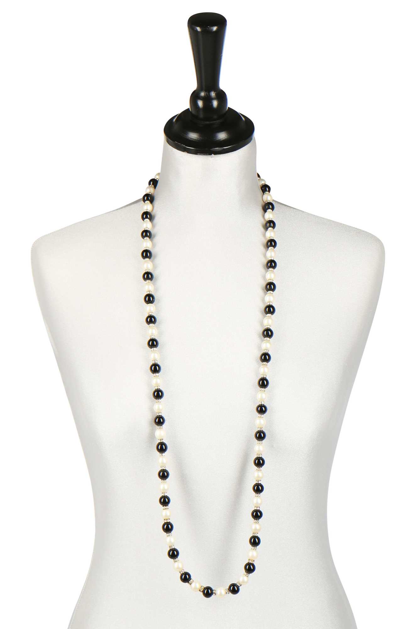 Click for high resolution Lot 19 - A Chanel sautoir of black and white 'pearls', 1981