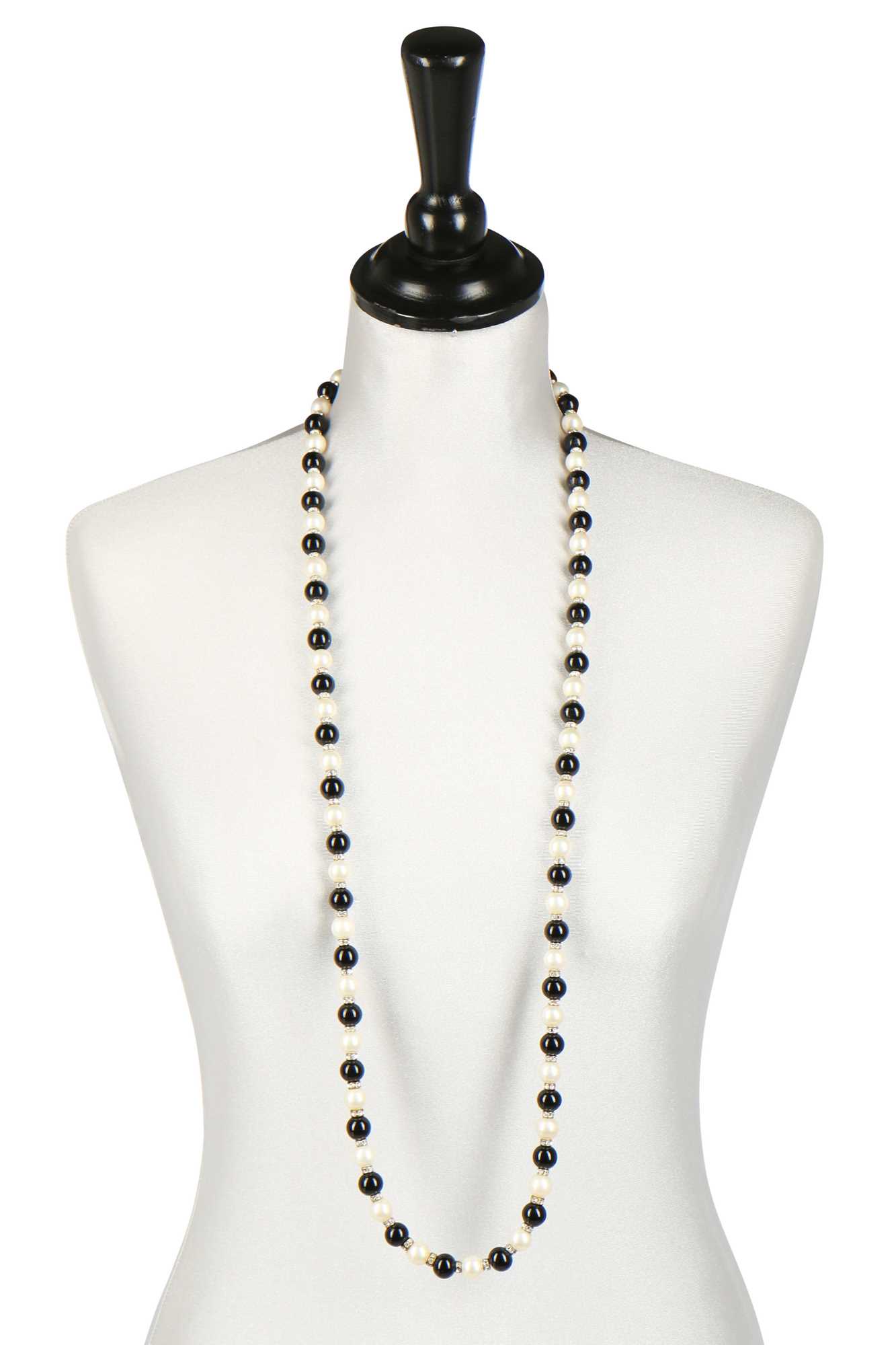 Lot 19 - A Chanel sautoir of black and white 'pearls', 1981