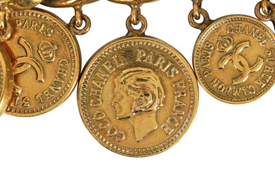 Lot 16 - A fine Chanel gilt 'coin' charm bracelet, probably 1970s