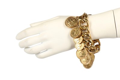 Lot 16 - A fine Chanel gilt 'coin' charm bracelet, probably 1970s
