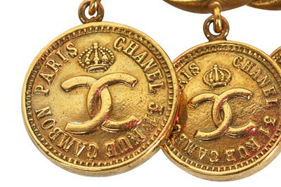 Lot 16 - A fine Chanel gilt 'coin' charm bracelet, probably 1970s