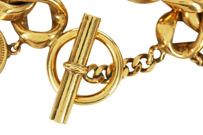 Lot 16 - A fine Chanel gilt 'coin' charm bracelet, probably 1970s