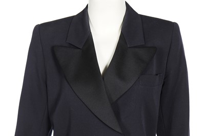 Lot 147 - An Yves Saint Laurent 'Le Smoking' skirt suit, 1980s