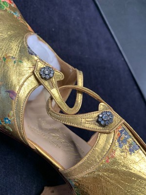 Lot 66 - A fine pair of Albertin gold leather evening shoes, circa 1928