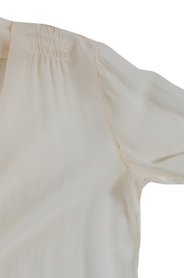Lot 54 - An ivory chiffon couture dinner dress, attributed to Gabrielle Chanel, circa 1925