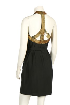 Lot 196 - A Moschino cocktail dress with gold-sequined 'Peace' sign halter-neck bodice, Spring-Summer 1994