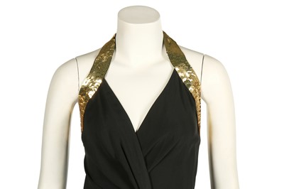 Lot 196 - A Moschino cocktail dress with gold-sequined 'Peace' sign halter-neck bodice, Spring-Summer 1994