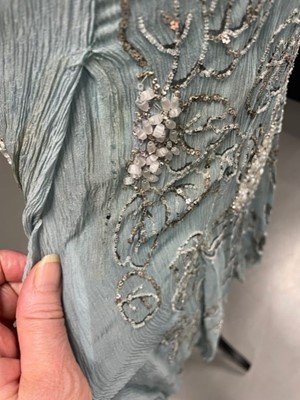 Lot 63 - A flapper dress of pale sea-blue crêpe chiffon, circa 1929