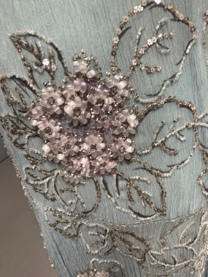 Lot 63 - A flapper dress of pale sea-blue crêpe chiffon, circa 1929