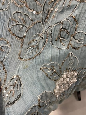 Lot 63 - A flapper dress of pale sea-blue crêpe chiffon, circa 1929