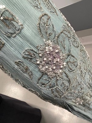 Lot 63 - A flapper dress of pale sea-blue crêpe chiffon, circa 1929